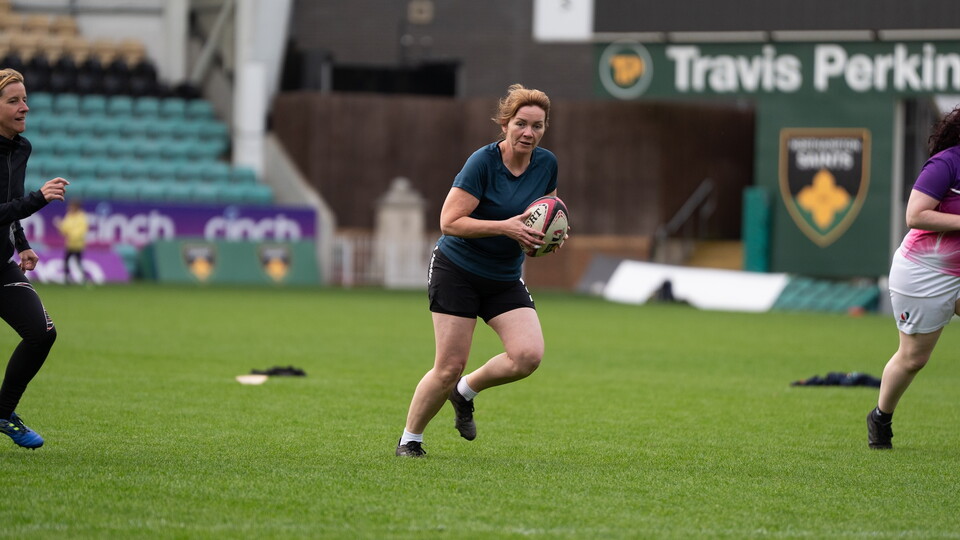 Women's touch rugby hero