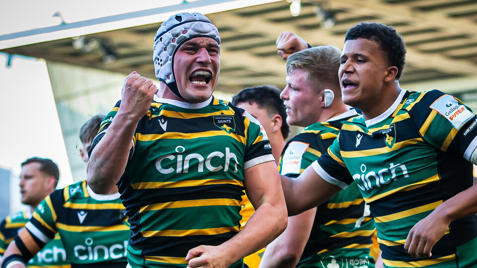 Northampton Saints celebrate scoring a try