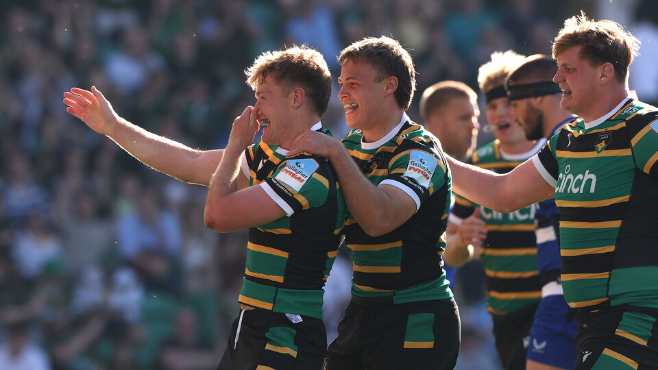 Northampton Saints celebrate scoring a try